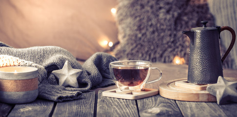 home comfort, details of the festive interior on a wooden table