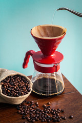 Pour hot water to drip coffee. Vintage style