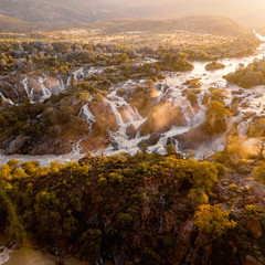 famous Epupa Falls on the Kunene River in Northern Namibia and Southern Angola border. Sunrise...
