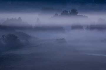 blue mist over a mysterious valley