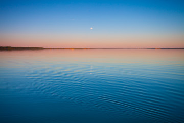The turquoise lake at dawn.