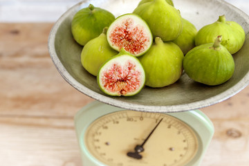 Antique kitchen scale and ripe figs