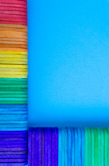 Colorful wooden or ice cream stick with selective focus and crop fragment