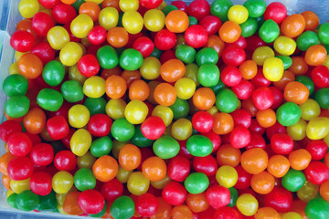 colorful candy with nuts inside. dragee on the market	