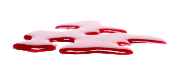 Spilled red wine puddle isolated on white background 