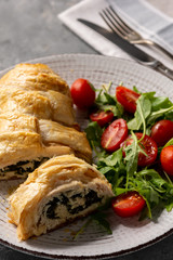 Spinach and mozzarella stuffed chicken breasts baked in puff pastry.
