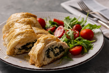 Spinach and mozzarella stuffed chicken breasts baked in puff pastry.