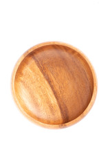 Wooden plate on white background