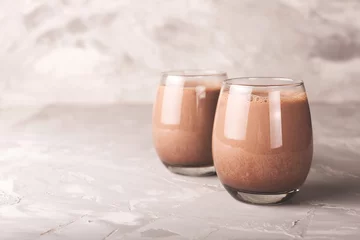 Rolgordijnen Two glasses of cocoa drink © Yulia Lisitsa