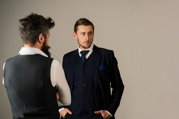 Style and status. Bonds of friendship and cooperation among businessmen. Fashion models in business relations. Men wear fashion business formal style. Friends in friendship relations, copy space