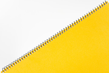 Top view of yellow spiral notebook, page