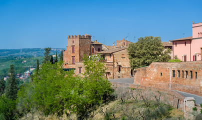Fototapeta na wymiar Viewpoint with fortress walls of old Certaldo