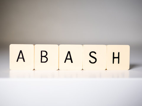 Closeup of abash word on white table.