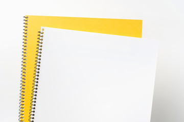 Top view of yellow spiral notebook, page