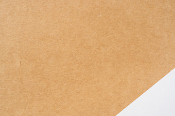 Top view of brown kraft and white page