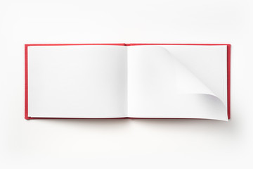 Top view of red notebook with open page