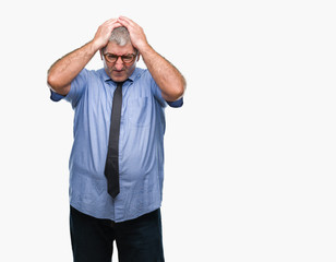 Fototapeta premium Handsome senior business man over isolated background suffering from headache desperate and stressed because pain and migraine. Hands on head.