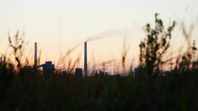 Environmental pollution Industrial enterprise at dawn.