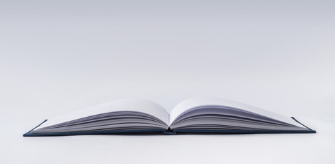 Perspective blue notebook with open page