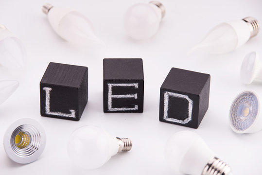 The inscription "LED"on the black cubes next to the LED lamps