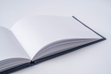 Perspective blue notebook with open page