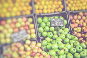Market stall with tropical fruits and vegetables. Selective Focus.
