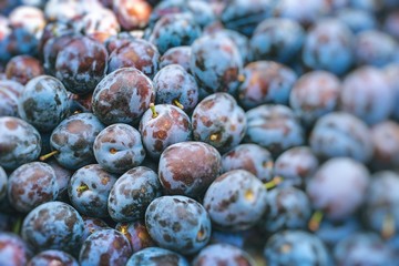 Plums on the market stand.Selective Focus.