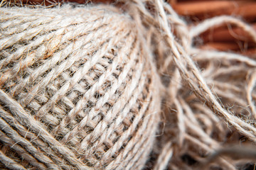 a tangle of linen thread from which a little floss photographed on macro optics