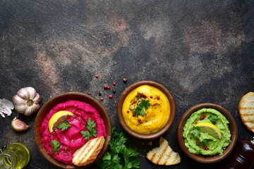 Assortment of hummus.Top view with copy space.