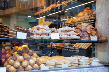 croissants and pastries in the bakery shop window