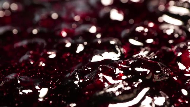 tasty and appetizing berry jam rotates