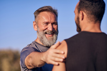 The happy father with son standing outdoor