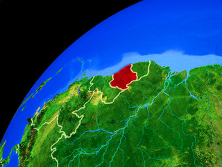 Suriname from space. Planet Earth with country borders and extremely high detail of planet surface.