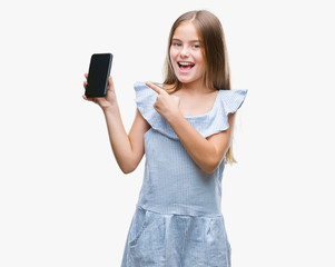 Naklejka premium Young beautiful girl talking on the phone over isolated background very happy pointing with hand and finger