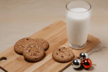 Cookie with milk on the table for Santa Claus