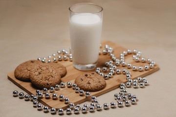 Cookie with milk on the table for Santa Claus