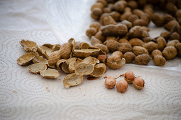 some peanuts with peel