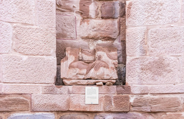 The remains of a bas-relief in a niche in the ruins of  Roman Temple in Petra. Near Wadi Musa city...
