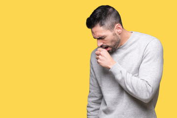 Young handsome man wearing sweatshirt over isolated background feeling unwell and coughing as symptom for cold or bronchitis. Healthcare concept.