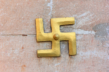 copper decorations on the wall in a temple