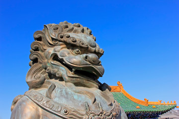 copper lions in a temple