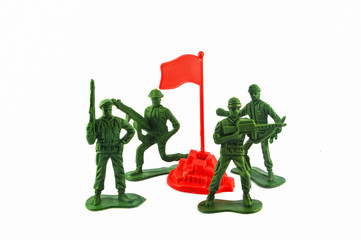 Toy soldier isolated on white background / Group of Miniature toy soldier with flag