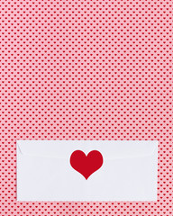 Blank envelope with heart decoration. St Valentine holiday mockup for design.