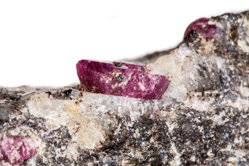 Macro of a mineral Ruby stone on a white background