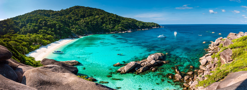 Panorama of a beautiful tropical sandy beach and lush green foliage on a tropical island (Koh Similan)