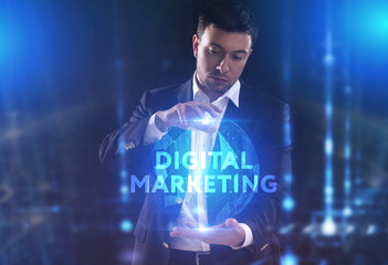 The concept of business, technology, the Internet and the network. A young entrepreneur working on a virtual screen of the future and sees the inscription: Digital Marketing