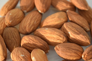 Almonds on white background