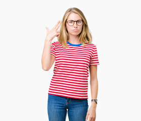 Beautiful young woman wearing glasses over isolated background Shooting and killing oneself pointing hand and fingers to head, suicide gesture.