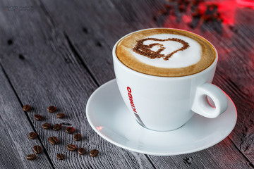 cup of coffee on wooden table