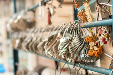 Machine production of duplicate metal keys for doors on the street of Bangkok.